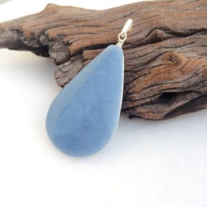 Shop Celestite Jewelry! Celestite pendant, Teardrop shaped Celestite pendant, Big size pendant, Large Angelite silver pendant, Throat chakra, Light blue Celestite | Natural genuine Celestite jewelry. Buy crystal jewelry, handmade handcrafted artisan jewelry for women.  Unique handmade gift ideas. #jewelry #beadedjewelry #beadedjewelry #gift #shopping #handmadejewelry #fashion #style #product #jewelry #affiliate #ad
