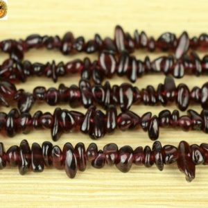 Shop Garnet Chip & Nugget Beads! Garnet,35 inch full strand Grade A Garnet chips beads,wine red color 4-6mm | Natural genuine chip Garnet beads for beading and jewelry making.  #jewelry #beads #beadedjewelry #diyjewelry #jewelrymaking #beadstore #beading #affiliate #ad