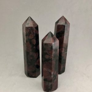 Shop Garnet Points & Wands! Large Garnet in Arfvendsonite Point | Natural genuine stones & crystals in various shapes & sizes. Buy raw cut, tumbled, or polished gemstones for making jewelry or crystal healing energy vibration raising reiki stones. #crystals #gemstones #crystalhealing #crystalsandgemstones #energyhealing #affiliate #ad
