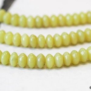 Shop Jade Rondelle Beads! M/ Olive Jade 8mm Abacus Rondelle beads Approx. 15.5 inches long Nephrite beads for jewelry making | Natural genuine rondelle Jade beads for beading and jewelry making.  #jewelry #beads #beadedjewelry #diyjewelry #jewelrymaking #beadstore #beading #affiliate #ad