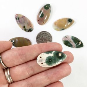 Shop Ocean Jasper Cabochons! Individual Carved Ocean Jasper Fish Cabochons // Ocean Jasper Cabochon // Gems // Cabochons // Jewelry Making Supplies / Village Silversmith | Natural genuine stones & crystals in various shapes & sizes. Buy raw cut, tumbled, or polished gemstones for making jewelry or crystal healing energy vibration raising reiki stones. #crystals #gemstones #crystalhealing #crystalsandgemstones #energyhealing #affiliate #ad