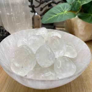 Shop Tumbled Quartz Crystals & Pocket Stones! Clear Quartz Pebble tumbled stone | Natural genuine stones & crystals in various shapes & sizes. Buy raw cut, tumbled, or polished gemstones for making jewelry or crystal healing energy vibration raising reiki stones. #crystals #gemstones #crystalhealing #crystalsandgemstones #energyhealing #affiliate #ad