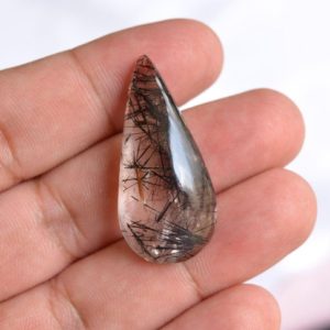 Shop Tourmalinated Quartz Cabochons! Rutilated Quartz Cabochon, Tourmalinated Quartz Smooth Pear Shape Cabochons, 39.40 Carat, Loose Gemstone, Huge 17x37mm, Gemstone For Jewelry | Natural genuine stones & crystals in various shapes & sizes. Buy raw cut, tumbled, or polished gemstones for making jewelry or crystal healing energy vibration raising reiki stones. #crystals #gemstones #crystalhealing #crystalsandgemstones #energyhealing #affiliate #ad