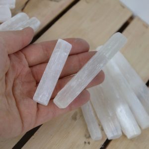 Shop Raw & Rough Selenite Stones! Raw Selenite Wand 10 cm, 15 cm, 20 cm | Selenite Stick | Crystals Charging Wand | Meditation Gift Idea | Made in Morocco | Natural genuine stones & crystals in various shapes & sizes. Buy raw cut, tumbled, or polished gemstones for making jewelry or crystal healing energy vibration raising reiki stones. #crystals #gemstones #crystalhealing #crystalsandgemstones #energyhealing #affiliate #ad