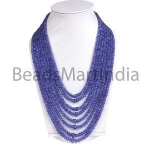 Shop Tanzanite Necklaces! 5-7Mm Tanzanite Faceted Rondelle Beads Necklace,Tanzanite Rondelle Beads,Tanzanite Faceted Beads,Blue Tanzanite Rondelle Beads Necklace | Natural genuine Tanzanite necklaces. Buy crystal jewelry, handmade handcrafted artisan jewelry for women.  Unique handmade gift ideas. #jewelry #beadednecklaces #beadedjewelry #gift #shopping #handmadejewelry #fashion #style #product #necklaces #affiliate #ad