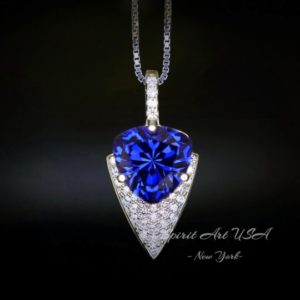 Shop Tanzanite Necklaces! Large Trillion Cut Blue Tanzanite Necklace – 18KGP Sterling Silver – Protective Queen's  Guard Sword Pendant –  December Birthstone | Natural genuine Tanzanite necklaces. Buy crystal jewelry, handmade handcrafted artisan jewelry for women.  Unique handmade gift ideas. #jewelry #beadednecklaces #beadedjewelry #gift #shopping #handmadejewelry #fashion #style #product #necklaces #affiliate #ad