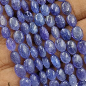 Shop Tanzanite Bead Shapes! Beautiful Natural Tanzanite Smooth Oval Shape Beads , tanzanite Plain Beads , tanzanite Oval Beads , blue Tanzania Beads, tanzanite Smooth Beads | Natural genuine other-shape Tanzanite beads for beading and jewelry making.  #jewelry #beads #beadedjewelry #diyjewelry #jewelrymaking #beadstore #beading #affiliate #ad