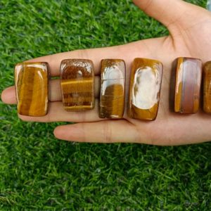 Shop Tumbled Tiger Eye Crystals & Pocket Stones! Tiger's Eye Tumbled Stones Rectangle 20-40mm | Natural genuine stones & crystals in various shapes & sizes. Buy raw cut, tumbled, or polished gemstones for making jewelry or crystal healing energy vibration raising reiki stones. #crystals #gemstones #crystalhealing #crystalsandgemstones #energyhealing #affiliate #ad
