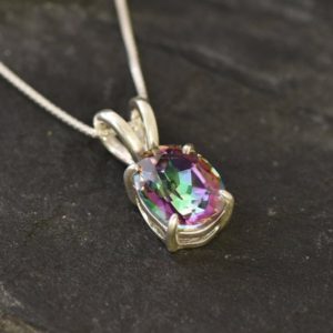 Shop Topaz Pendants! Mystic Topaz Pendant, Natural Mystic Topaz, December Birthstone, December Gift, Dainty Pendant, Rainbow Topaz, Small Oval Pendant, Silver | Natural genuine Topaz pendants. Buy crystal jewelry, handmade handcrafted artisan jewelry for women.  Unique handmade gift ideas. #jewelry #beadedpendants #beadedjewelry #gift #shopping #handmadejewelry #fashion #style #product #pendants #affiliate #ad
