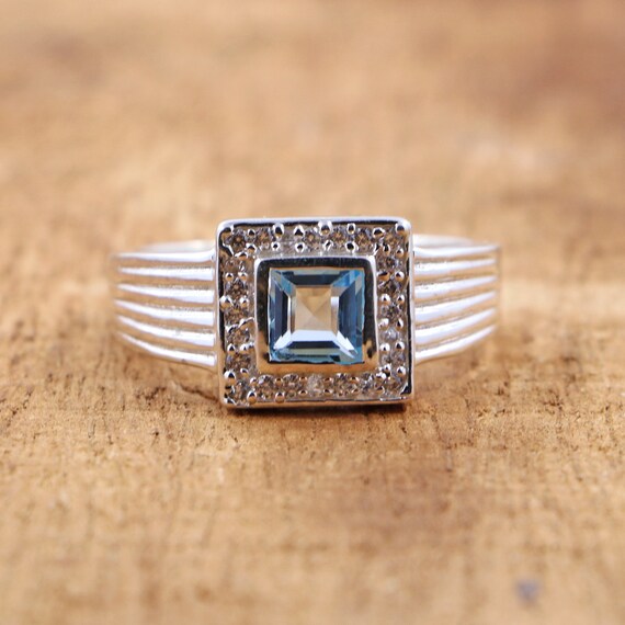Swiss Blue Topaz Ring: Sterling Silver, Cubic Zirconia Accents