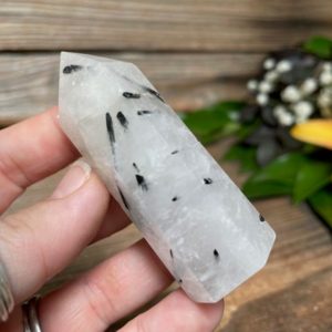 Shop Tourmalinated Quartz Points & Wands! Tourmalinated Quartz Crystal Point | Natural genuine stones & crystals in various shapes & sizes. Buy raw cut, tumbled, or polished gemstones for making jewelry or crystal healing energy vibration raising reiki stones. #crystals #gemstones #crystalhealing #crystalsandgemstones #energyhealing #affiliate #ad