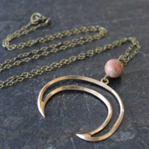 Shop Unakite Pendants! Long Gold Crescent Necklace, Antique Brass Chain, Crescent Moon Pendant, Metal Necklace, Crescent Celestial Jewelry, Unakite Pendant | Natural genuine Unakite pendants. Buy crystal jewelry, handmade handcrafted artisan jewelry for women.  Unique handmade gift ideas. #jewelry #beadedpendants #beadedjewelry #gift #shopping #handmadejewelry #fashion #style #product #pendants #affiliate #ad