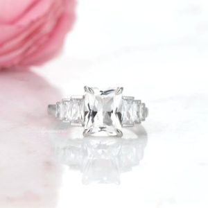 Shop Unique Engagement Rings Under $100! White Sapphire Ring Sterling Silver Emerald Cut Diamond Engagement Ring For Women Promise Ring September Birthstone Anniversary Gift For Her | Natural genuine Amethyst rings, simple unique alternative gemstone engagement rings. #rings #jewelry #bridal #wedding #jewelryaccessories #engagementrings #weddingideas #affiliate #ad