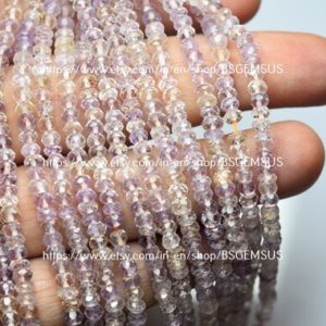 Shop Ametrine Faceted Beads! 13 Inch strand, Natural Ametrine Faceted Rondelles. 4-4.25mm | Natural genuine faceted Ametrine beads for beading and jewelry making.  #jewelry #beads #beadedjewelry #diyjewelry #jewelrymaking #beadstore #beading #affiliate #ad