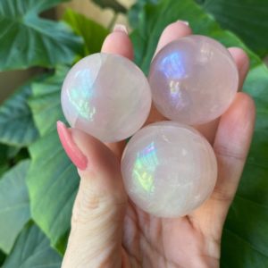 Shop Angel Aura Quartz Shapes! Angel Aura Rose quartz sphere, orb | Natural genuine stones & crystals in various shapes & sizes. Buy raw cut, tumbled, or polished gemstones for making jewelry or crystal healing energy vibration raising reiki stones. #crystals #gemstones #crystalhealing #crystalsandgemstones #energyhealing #affiliate #ad