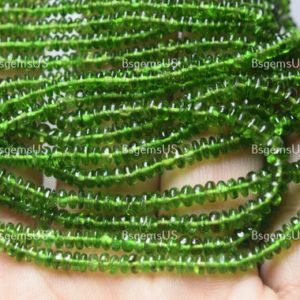Shop Diopside Rondelle Beads! 16 Inch Strand, Natural Chrome Diopside Smooth Rondelles. Size 3-4.5mm | Natural genuine rondelle Diopside beads for beading and jewelry making.  #jewelry #beads #beadedjewelry #diyjewelry #jewelrymaking #beadstore #beading #affiliate #ad