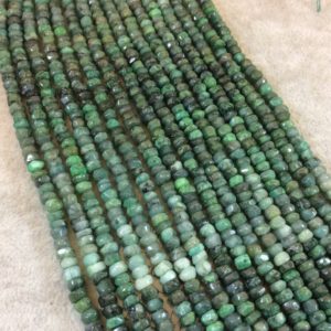 Shop Emerald Faceted Beads! 4-5mm Faceted Rondelle Shaped Multi-shade Emerald Beads – 13" Strand (Approx. 113 Beads) – High Quality Hand-Cut Semi-Precious Gemstone | Natural genuine faceted Emerald beads for beading and jewelry making.  #jewelry #beads #beadedjewelry #diyjewelry #jewelrymaking #beadstore #beading #affiliate #ad