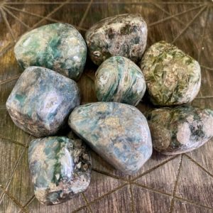 Shop Tumbled Kyanite Crystals & Pocket Stones! Green Kyanite Large Tumbled | Rare Heart Chakra Clearing Illumination Release Grounding Healing Crystal | Natural genuine stones & crystals in various shapes & sizes. Buy raw cut, tumbled, or polished gemstones for making jewelry or crystal healing energy vibration raising reiki stones. #crystals #gemstones #crystalhealing #crystalsandgemstones #energyhealing #affiliate #ad