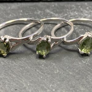 Shop Moldavite Jewelry! Small Pear Moldavite ring – Faceted Moldavite Ring US sizes+ certificate of authenticity | Natural genuine Moldavite jewelry. Buy crystal jewelry, handmade handcrafted artisan jewelry for women.  Unique handmade gift ideas. #jewelry #beadedjewelry #beadedjewelry #gift #shopping #handmadejewelry #fashion #style #product #jewelry #affiliate #ad