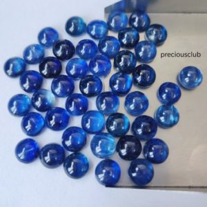 Shop Kyanite Cabochons! Natural Blue Kyanite 7mm Round Cabochon AAA Quality – Loose Kyanite Cabochon AAA Quality | Natural genuine stones & crystals in various shapes & sizes. Buy raw cut, tumbled, or polished gemstones for making jewelry or crystal healing energy vibration raising reiki stones. #crystals #gemstones #crystalhealing #crystalsandgemstones #energyhealing #affiliate #ad