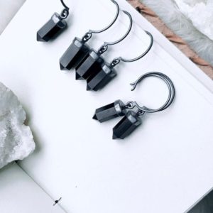Shop Onyx Jewelry! Black onyx point earrings, raw crystal earrings, boho earrings, crystal point earrings | Natural genuine Onyx jewelry. Buy crystal jewelry, handmade handcrafted artisan jewelry for women.  Unique handmade gift ideas. #jewelry #beadedjewelry #beadedjewelry #gift #shopping #handmadejewelry #fashion #style #product #jewelry #affiliate #ad