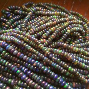 Shop Opal Rondelle Beads! 3mm To 3.5mm Black Opal Smooth Rondelle Beads, Ethiopian Opal Black Beads, 16 Inch Strand, GDS696 | Natural genuine rondelle Opal beads for beading and jewelry making.  #jewelry #beads #beadedjewelry #diyjewelry #jewelrymaking #beadstore #beading #affiliate #ad