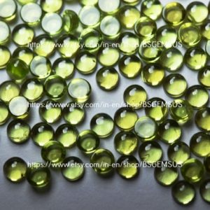 Shop Peridot Stones & Crystals! 20 Pieces, Natural Peridot Smooth Coin Cabochon, Loose Stones 4mm -20 pcs | Natural genuine stones & crystals in various shapes & sizes. Buy raw cut, tumbled, or polished gemstones for making jewelry or crystal healing energy vibration raising reiki stones. #crystals #gemstones #crystalhealing #crystalsandgemstones #energyhealing #affiliate #ad