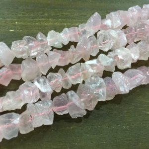 Shop Crystal Beads for Jewelry Making! Raw Rose Quartz Nugget beads Rough Pink Quartz Crystal Chip beads Hammered Quartz Jewelry making supplies 14-16mm 15.5" full strand | Natural genuine beads Quartz beads for beading and jewelry making.  #jewelry #beads #beadedjewelry #diyjewelry #jewelrymaking #beadstore #beading #affiliate #ad