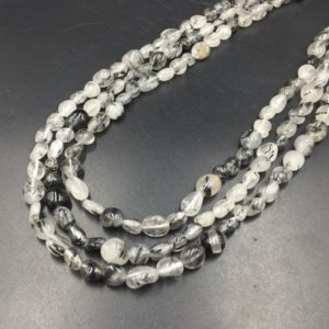 Shop Rutilated Quartz Chip & Nugget Beads! Black Rutilated Quartz Beads Pebble Beads Nugget Beads 6-8mm Natural Black Rutilated Quartz Crystal Gemstone Beads 15.5" Strand | Natural genuine chip Rutilated Quartz beads for beading and jewelry making.  #jewelry #beads #beadedjewelry #diyjewelry #jewelrymaking #beadstore #beading #affiliate #ad