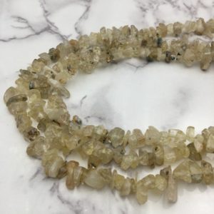 Shop Rutilated Quartz Chip & Nugget Beads! Golden Rutilated Quartz Irregular Nugget Chips Beads Approx 7-8mm 34" Strand | Natural genuine chip Rutilated Quartz beads for beading and jewelry making.  #jewelry #beads #beadedjewelry #diyjewelry #jewelrymaking #beadstore #beading #affiliate #ad