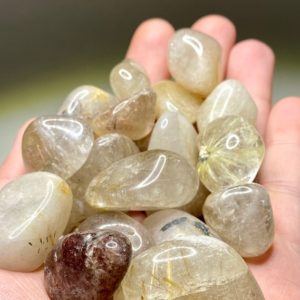 Shop Tumbled Rutilated Quartz Crystals & Pocket Stones! Rutilated Quartz Tumbled Stones | Natural genuine stones & crystals in various shapes & sizes. Buy raw cut, tumbled, or polished gemstones for making jewelry or crystal healing energy vibration raising reiki stones. #crystals #gemstones #crystalhealing #crystalsandgemstones #energyhealing #affiliate #ad