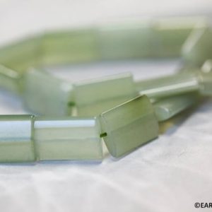 Shop Serpentine Bead Shapes! L/ New Jade 15x20mm Flat Rectangle beads 16" strand Natural light green serpentine beads Size/Shade varies For jewelry making | Natural genuine other-shape Serpentine beads for beading and jewelry making.  #jewelry #beads #beadedjewelry #diyjewelry #jewelrymaking #beadstore #beading #affiliate #ad