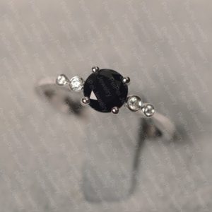 Shop Spinel Jewelry! Black spinel ring sterling silver engagement ring 5 stone round cut black gemstone ring | Natural genuine Spinel jewelry. Buy handcrafted artisan wedding jewelry.  Unique handmade bridal jewelry gift ideas. #jewelry #beadedjewelry #gift #crystaljewelry #shopping #handmadejewelry #wedding #bridal #jewelry #affiliate #ad