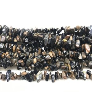 Shop Tiger Eye Chip & Nugget Beads! Natural Blue Tiger Eyes 5-8mm Chips Genuine Loose Yellow Nugget Beads 34 inch Jewelry Supply Bracelet Necklace Material Support Wholesale | Natural genuine chip Tiger Eye beads for beading and jewelry making.  #jewelry #beads #beadedjewelry #diyjewelry #jewelrymaking #beadstore #beading #affiliate #ad