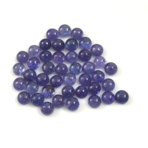 Shop Tanzanite Cabochons! 4mm Natural Tanzanite Round Cabochon Gemstone- Top Quality Loose Tanzanite Gems | Natural genuine stones & crystals in various shapes & sizes. Buy raw cut, tumbled, or polished gemstones for making jewelry or crystal healing energy vibration raising reiki stones. #crystals #gemstones #crystalhealing #crystalsandgemstones #energyhealing #affiliate #ad