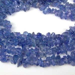 Shop Tanzanite Beads! AAA quality Natural Tanzanite chips Beads / Tanzanite Rough uneven shape smooth uncut Beads 3-5mm 35"inch | Natural genuine beads Tanzanite beads for beading and jewelry making.  #jewelry #beads #beadedjewelry #diyjewelry #jewelrymaking #beadstore #beading #affiliate #ad