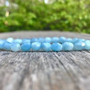 Shop Aquamarine Bracelets! Dainty Aquamarine Faceted Nugget Bracelet 7-9mm Light Blue And Clear Aquamarine Beaded Gemstone Bracelet Blue Nugget Stack Bracelet | Natural genuine Aquamarine bracelets. Buy crystal jewelry, handmade handcrafted artisan jewelry for women.  Unique handmade gift ideas. #jewelry #beadedbracelets #beadedjewelry #gift #shopping #handmadejewelry #fashion #style #product #bracelets #affiliate #ad