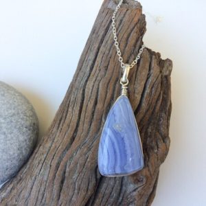 Shop Blue Lace Agate Pendants! Blue lace agate pendant, Natural Blue stone pendant, Light Blue gem Sterling silver pendant, Irregular drop shape, Unisex pendant necklace | Natural genuine Blue Lace Agate pendants. Buy crystal jewelry, handmade handcrafted artisan jewelry for women.  Unique handmade gift ideas. #jewelry #beadedpendants #beadedjewelry #gift #shopping #handmadejewelry #fashion #style #product #pendants #affiliate #ad