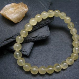 Shop Calcite Bracelets! Yellow Calcite Genuine Bracelet ~ 7 Inches  ~ 8mm  Round Beads | Natural genuine Calcite bracelets. Buy crystal jewelry, handmade handcrafted artisan jewelry for women.  Unique handmade gift ideas. #jewelry #beadedbracelets #beadedjewelry #gift #shopping #handmadejewelry #fashion #style #product #bracelets #affiliate #ad