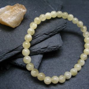 Shop Calcite Bracelets! Yellow Calcite Genuine Bracelet ~ 7 Inches  ~ 6mm  Round Beads | Natural genuine Calcite bracelets. Buy crystal jewelry, handmade handcrafted artisan jewelry for women.  Unique handmade gift ideas. #jewelry #beadedbracelets #beadedjewelry #gift #shopping #handmadejewelry #fashion #style #product #bracelets #affiliate #ad