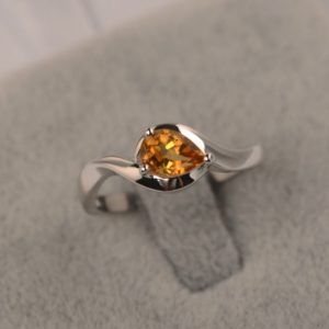 Yellow citrine white gold solitaire engagement ring pear cut November Birthstone ring | Natural genuine Array rings, simple unique alternative gemstone engagement rings. #rings #jewelry #bridal #wedding #jewelryaccessories #engagementrings #weddingideas #affiliate #ad