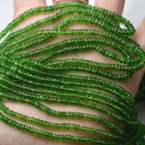 Shop Diopside Rondelle Beads! 8 Inch Strand, Natural Chrome Diopside Smooth Rondelles. Size 3-4mm | Natural genuine rondelle Diopside beads for beading and jewelry making.  #jewelry #beads #beadedjewelry #diyjewelry #jewelrymaking #beadstore #beading #affiliate #ad
