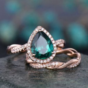 2pcs pear shaped emerald engagement ring set 14k rose gold emerald ring vintage full eternity diamond ring May birthstone ring bridal set | Natural genuine Array rings, simple unique alternative gemstone engagement rings. #rings #jewelry #bridal #wedding #jewelryaccessories #engagementrings #weddingideas #affiliate #ad