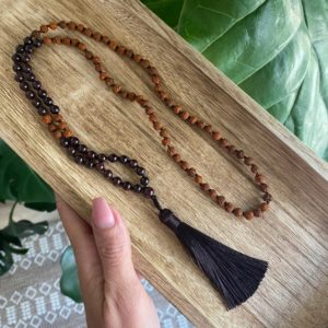Shop Garnet Necklaces! Garnet and rudraksha seed mala necklace with silk thread | Natural genuine Garnet necklaces. Buy crystal jewelry, handmade handcrafted artisan jewelry for women.  Unique handmade gift ideas. #jewelry #beadednecklaces #beadedjewelry #gift #shopping #handmadejewelry #fashion #style #product #necklaces #affiliate #ad