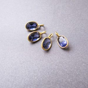 Shop Iolite Jewelry! 18k Gold Iolite Charm • 3mm ring with 1.60mm Hole • 6x4mm Natural Gemstone • Solid 18 Carat Gold | Natural genuine Iolite jewelry. Buy crystal jewelry, handmade handcrafted artisan jewelry for women.  Unique handmade gift ideas. #jewelry #beadedjewelry #beadedjewelry #gift #shopping #handmadejewelry #fashion #style #product #jewelry #affiliate #ad