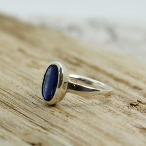 Shop Kyanite Rings! Tiny Blue Kyanite ring natural Cyanite stone cab set on 925e sterling silver and amazing quality bezel solid silver all natural stone | Natural genuine Kyanite rings, simple unique handcrafted gemstone rings. #rings #jewelry #shopping #gift #handmade #fashion #style #affiliate #ad