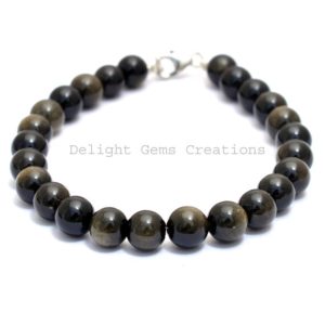 Golden Black Obsidian Beaded Bracelet, 8mm Natural Obsidian Smooth Round Beads Bracelet 8", Gemstone Bracelet, Cleanser//Protection Bracelet | Natural genuine Array bracelets. Buy crystal jewelry, handmade handcrafted artisan jewelry for women.  Unique handmade gift ideas. #jewelry #beadedbracelets #beadedjewelry #gift #shopping #handmadejewelry #fashion #style #product #bracelets #affiliate #ad