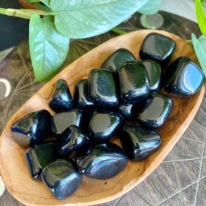 Shop Tumbled Obsidian Crystals & Pocket Stones! Black Obsidian Tumbled Stone | Gemstone Crystal | Natural genuine stones & crystals in various shapes & sizes. Buy raw cut, tumbled, or polished gemstones for making jewelry or crystal healing energy vibration raising reiki stones. #crystals #gemstones #crystalhealing #crystalsandgemstones #energyhealing #affiliate #ad
