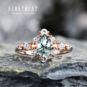 Shop Moss Agate Rings! Pear Cut Engagement Ring/Moss Agate Ring/Moss Agate Promise Ring/Diamond Moissanite Cluster Ring/14K Solid Gold Wedding Ring | Natural genuine Moss Agate rings, simple unique alternative gemstone engagement rings. #rings #jewelry #bridal #wedding #jewelryaccessories #engagementrings #weddingideas #affiliate #ad