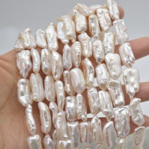 Shop Pearl Bead Shapes! High Quality Grade AA Natural Long Keshi Pearl Pink Tone with Irridecent Hue Pearl Beads – 10mm – 11mm x 18mm – 14"  strand | Natural genuine other-shape Pearl beads for beading and jewelry making.  #jewelry #beads #beadedjewelry #diyjewelry #jewelrymaking #beadstore #beading #affiliate #ad